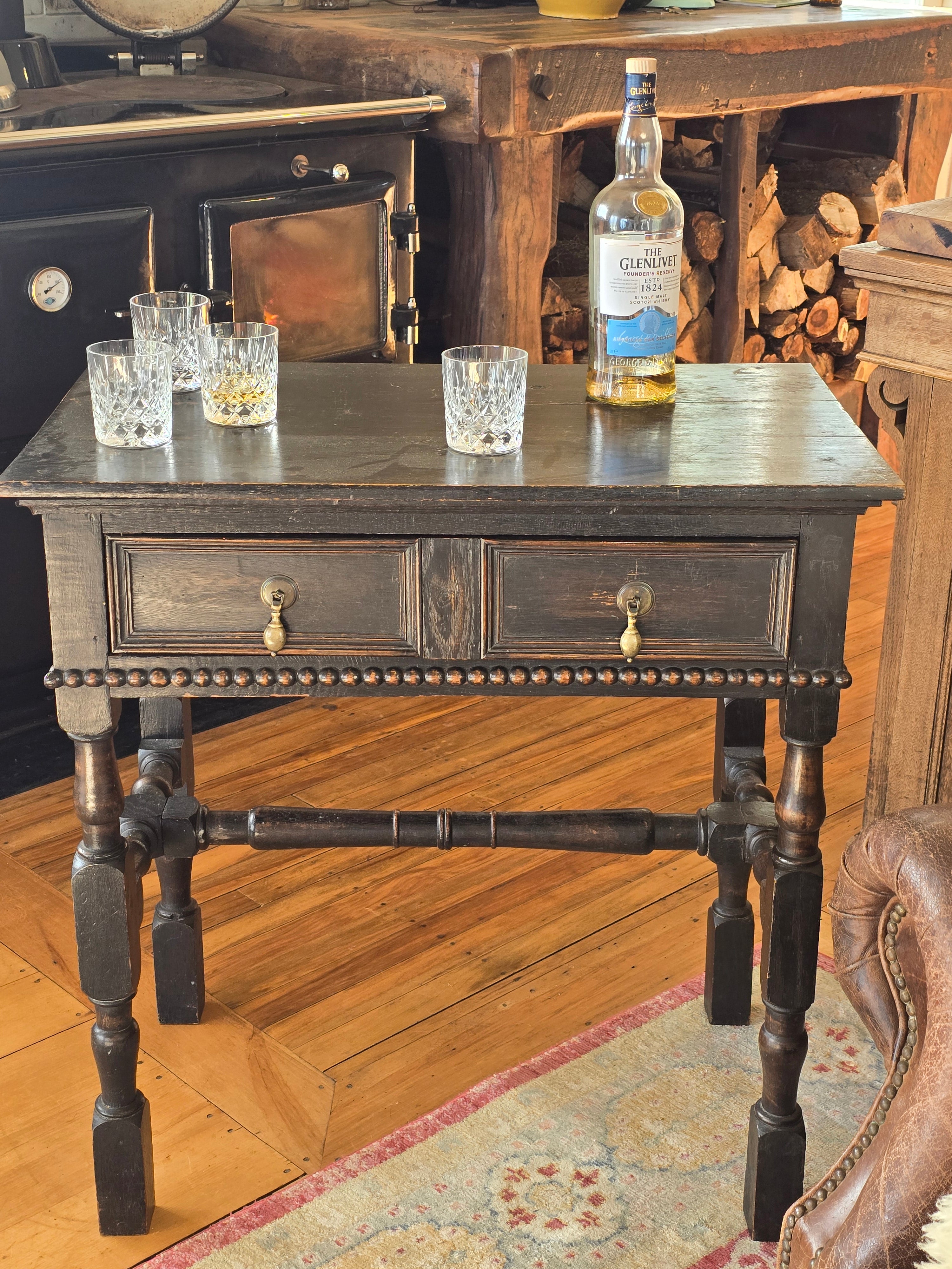 JACOBEAN STYLE OAK LOWBOW TABLE
